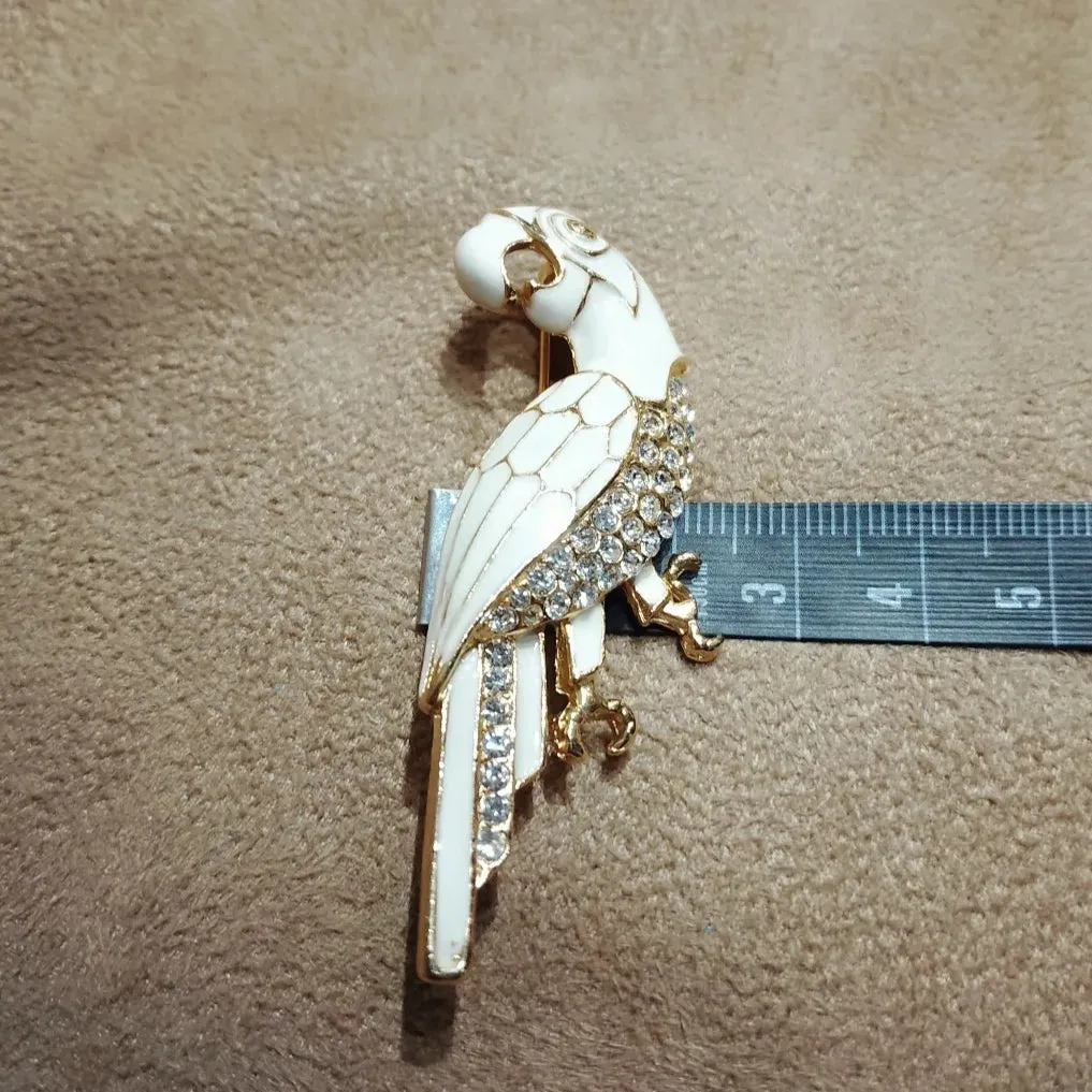 White enamel parrot brooch