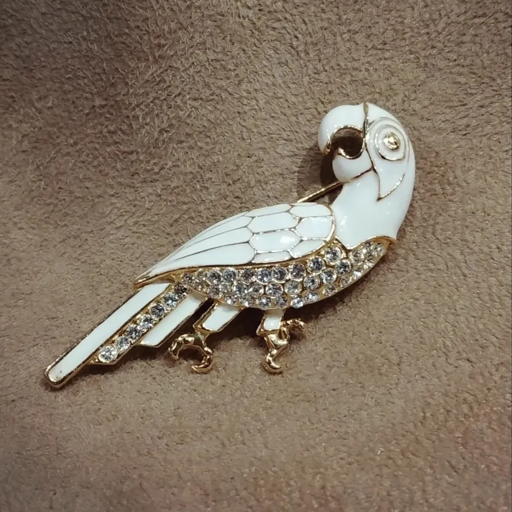 White enamel parrot brooch